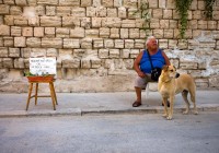Meglio un cane amico che un cane amico : Half a loaf is better than no bread